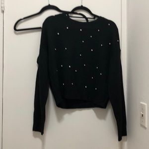 Black sweater with embroidered pearls